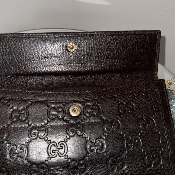 Gucci Chocolate Brown Long Wallet has its crossbody chain attached. - Picture 3 of 10